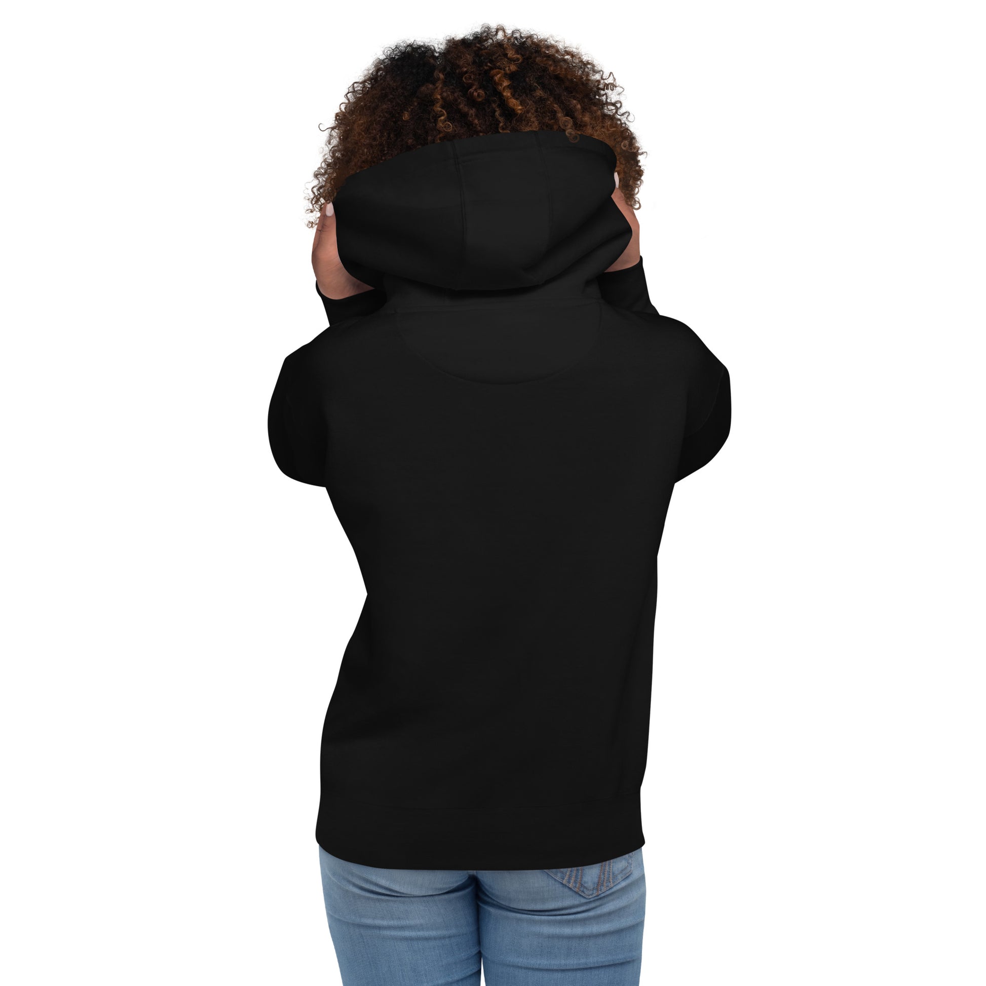 A black female wearing a pullover hoodie(backview) with a stylish red graphic of a stylized skull wearing a fedora hat and a mustache. Purple cross symbols are scattered around the skull, and the text 'NIBO' is written below it. The design is a spiritual nod to Haitian Gede culture.