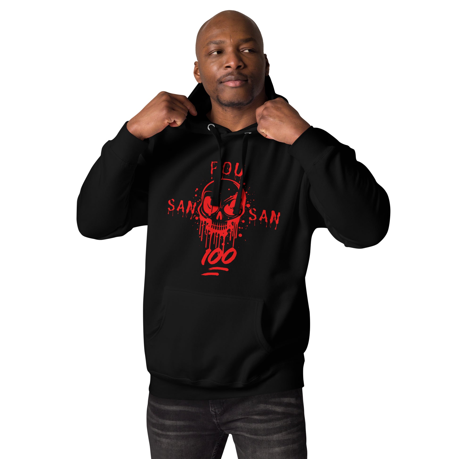 black man model wearing a black hoodie with a bold red graphic of a stylized skull with drips and splatters. The text 'SAN POU SAN' is on either side of the skull, and '100' is at the bottom, all in red. he is standing with her hands holding the hood of the hoodie. The design is a powerful statement of loyalty and the phrase 'blood for blood.