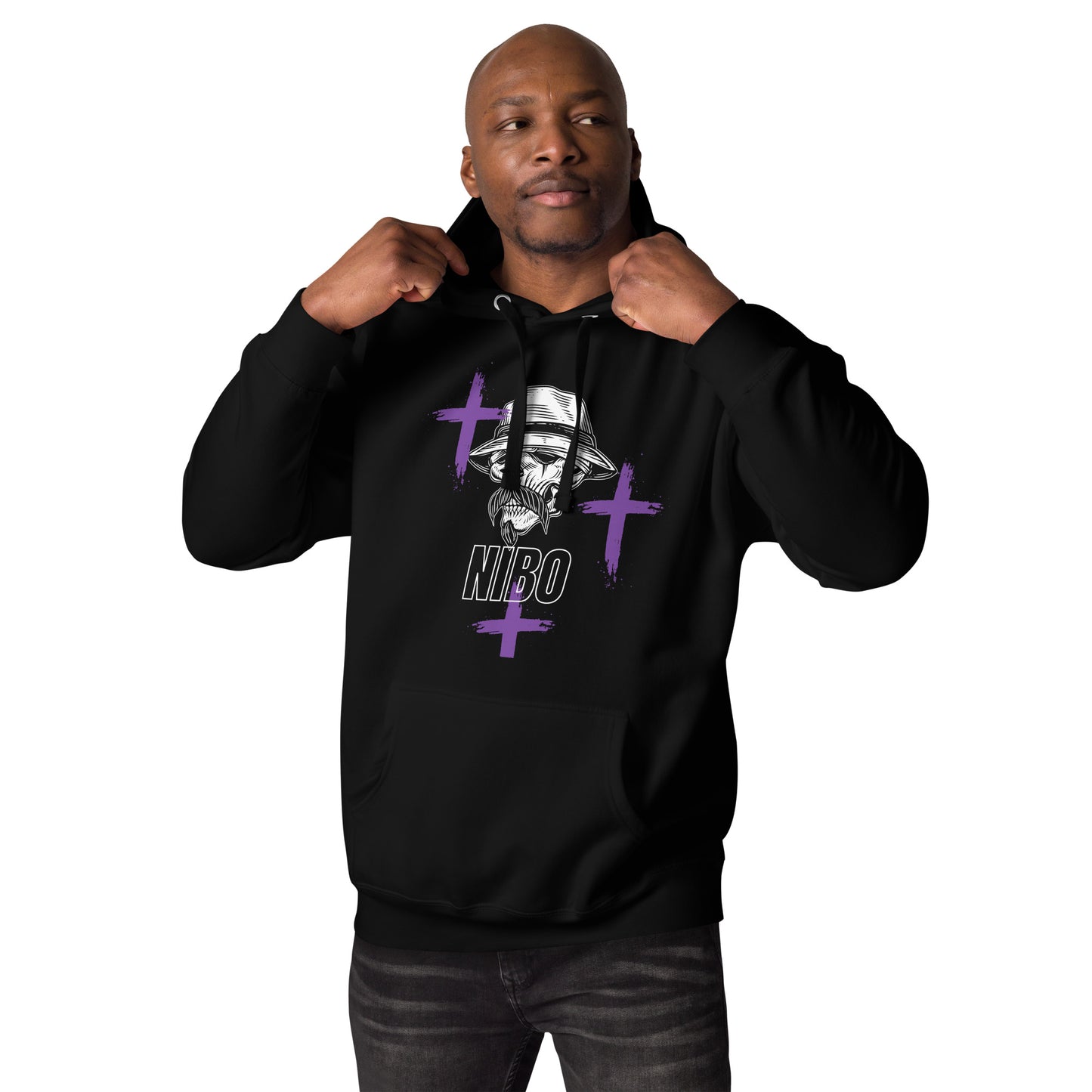 A black male model pullover hoodie with a stylish red graphic of a stylized skull wearing a fedora hat and a mustache. Purple cross symbols are scattered around the skull, and the text 'NIBO' is written below it. The design is a spiritual nod to Haitian Gede culture.