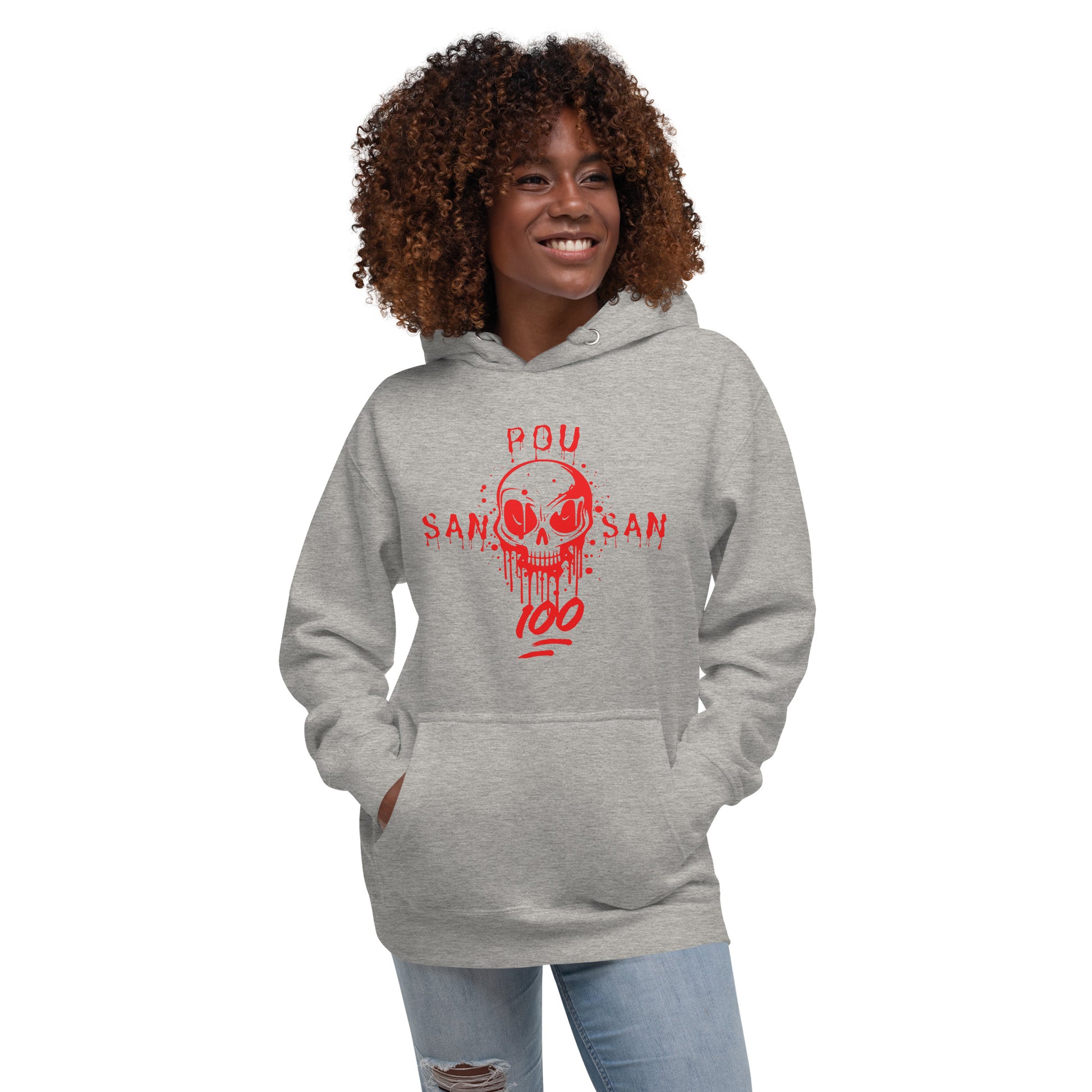 Smiling black woman model wearing a grey hoodie with a bold red graphic of a stylized skull with drips and splatters. The text 'SAN POU SAN' is on either side of the skull, and '100' is at the bottom, all in red. She is standing with her hands in the hoodie pouch. The design is a powerful statement of loyalty and the phrase 'blood for blood.