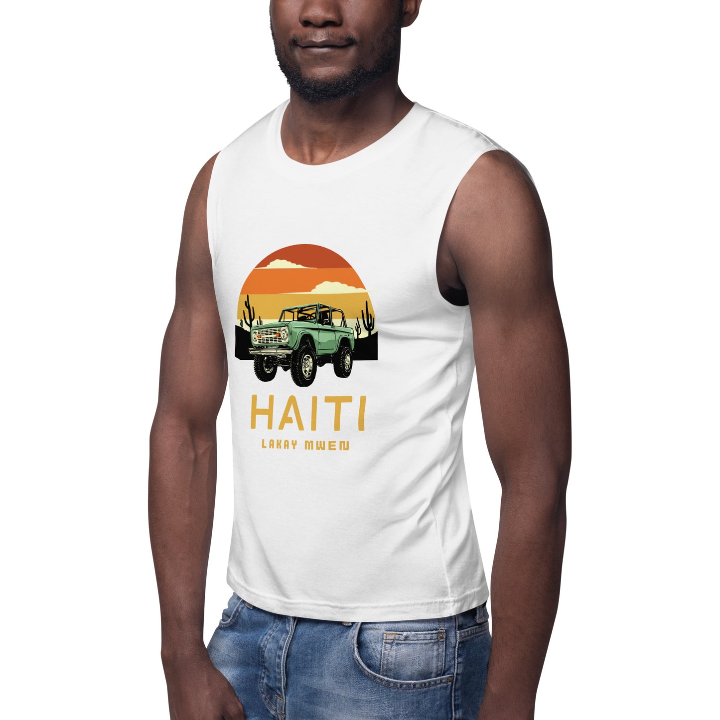 Black male model wearing a white Bella+Canvas 'HAITI LAKAY MWEN' unisex muscle tank top (front view) featuring a retro sunset and green vintage Jeep graphic.