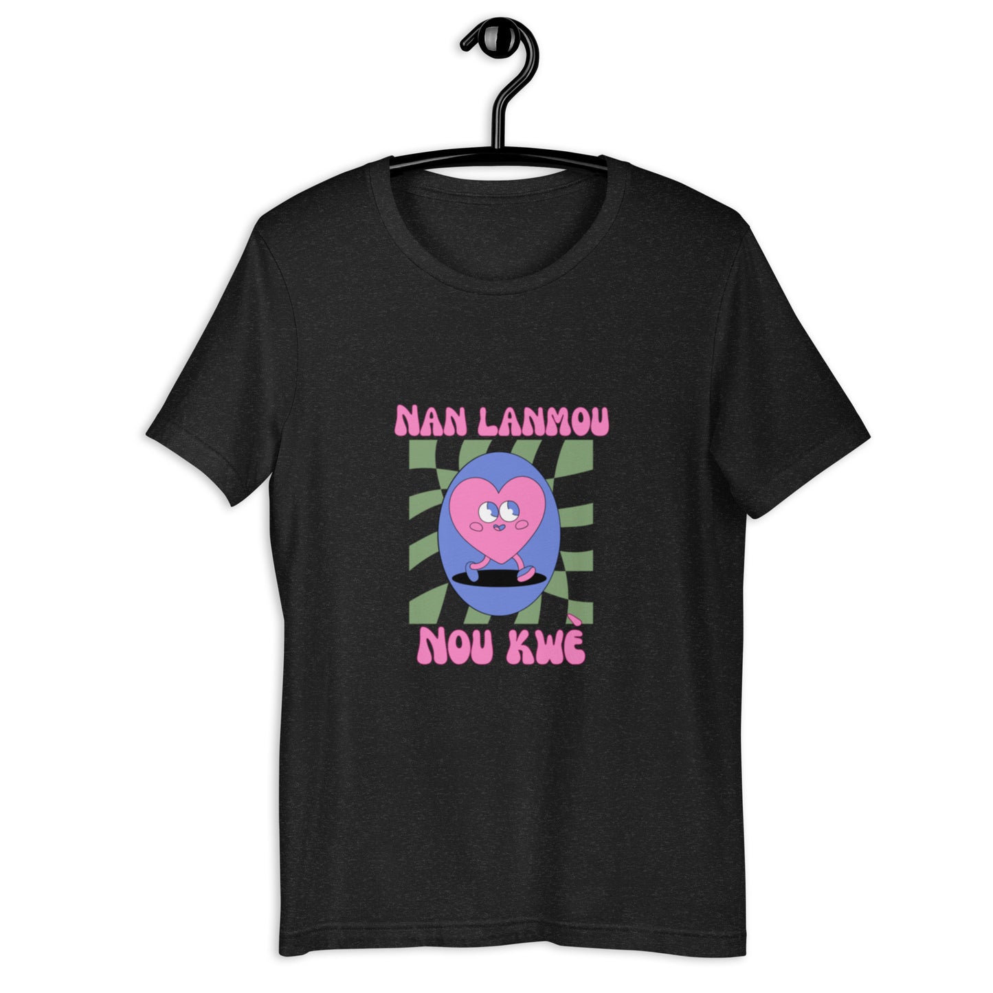 Black Bella+Canvas 'Nan Lanmou Nou Kwe' unisex T-shirt (front view) featuring a pink and blue abstract heart graphic with a smiley face and paint drip accents.