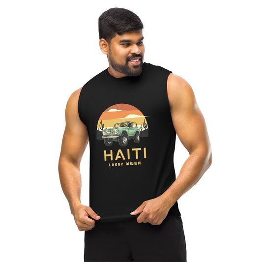 Male model wearing a black Bella+Canvas 'HAITI LAKAY MWEN' unisex muscle tank top (front view) featuring a retro sunset and green vintage Jeep graphic. White background. 